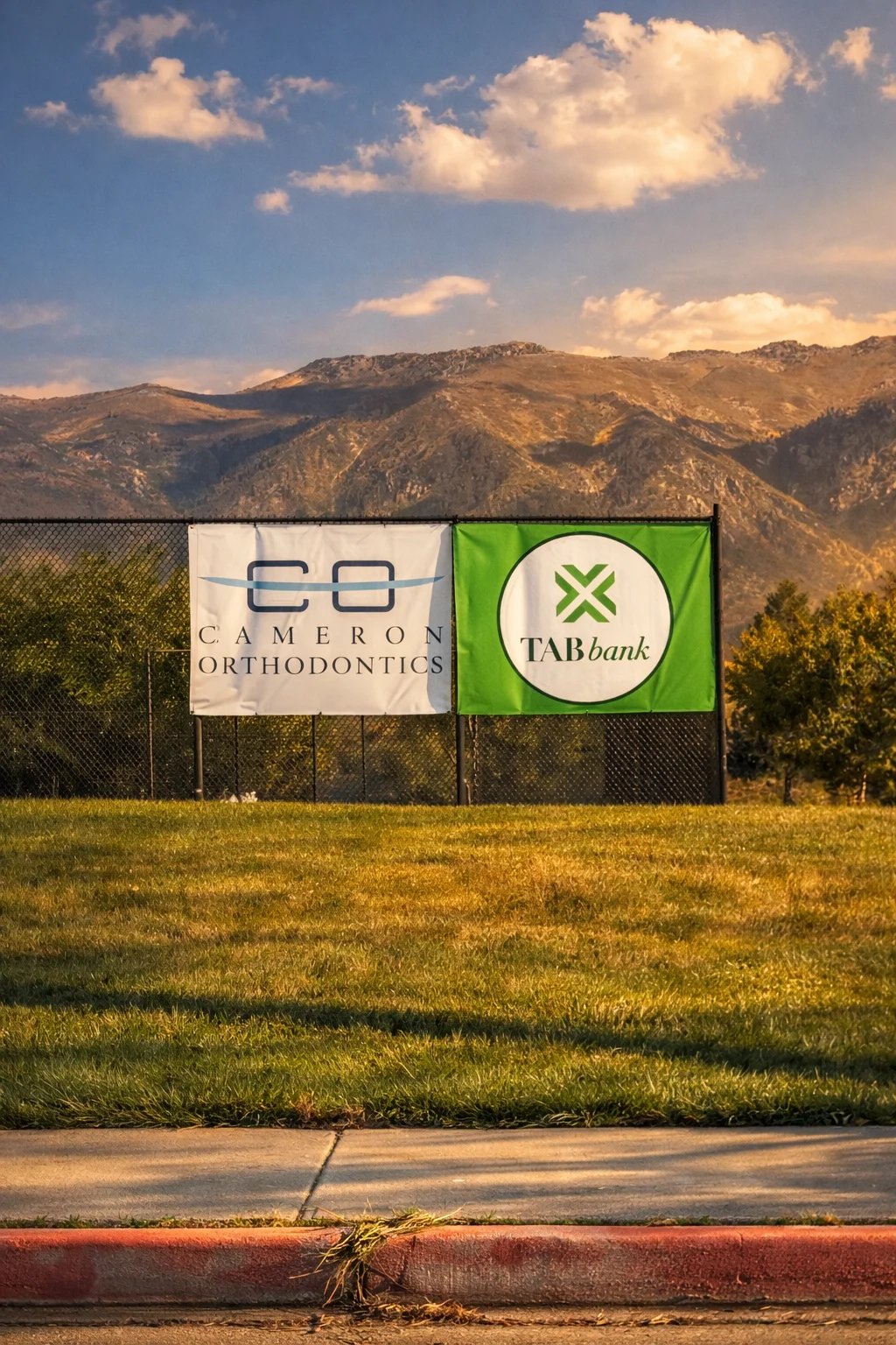 Sponsor banners at Northridge Tennis Courts